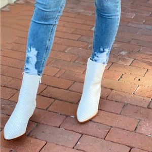 Matisse white snake skin booties with a natural heel.